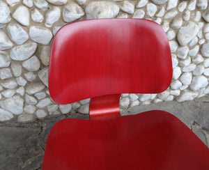 Red Stained LCW Lounge Chair by Charles & Ray Eames for Evans Products Company, 1948