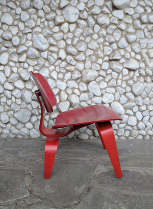 Red Stained LCW Lounge Chair by Charles & Ray Eames for Evans Products Company, 1948