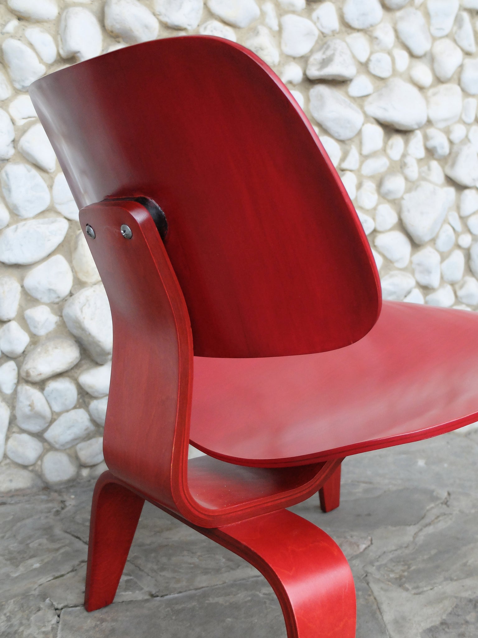 Red Stained LCW Lounge Chair by Charles & Ray Eames for Evans Products Company, 1948