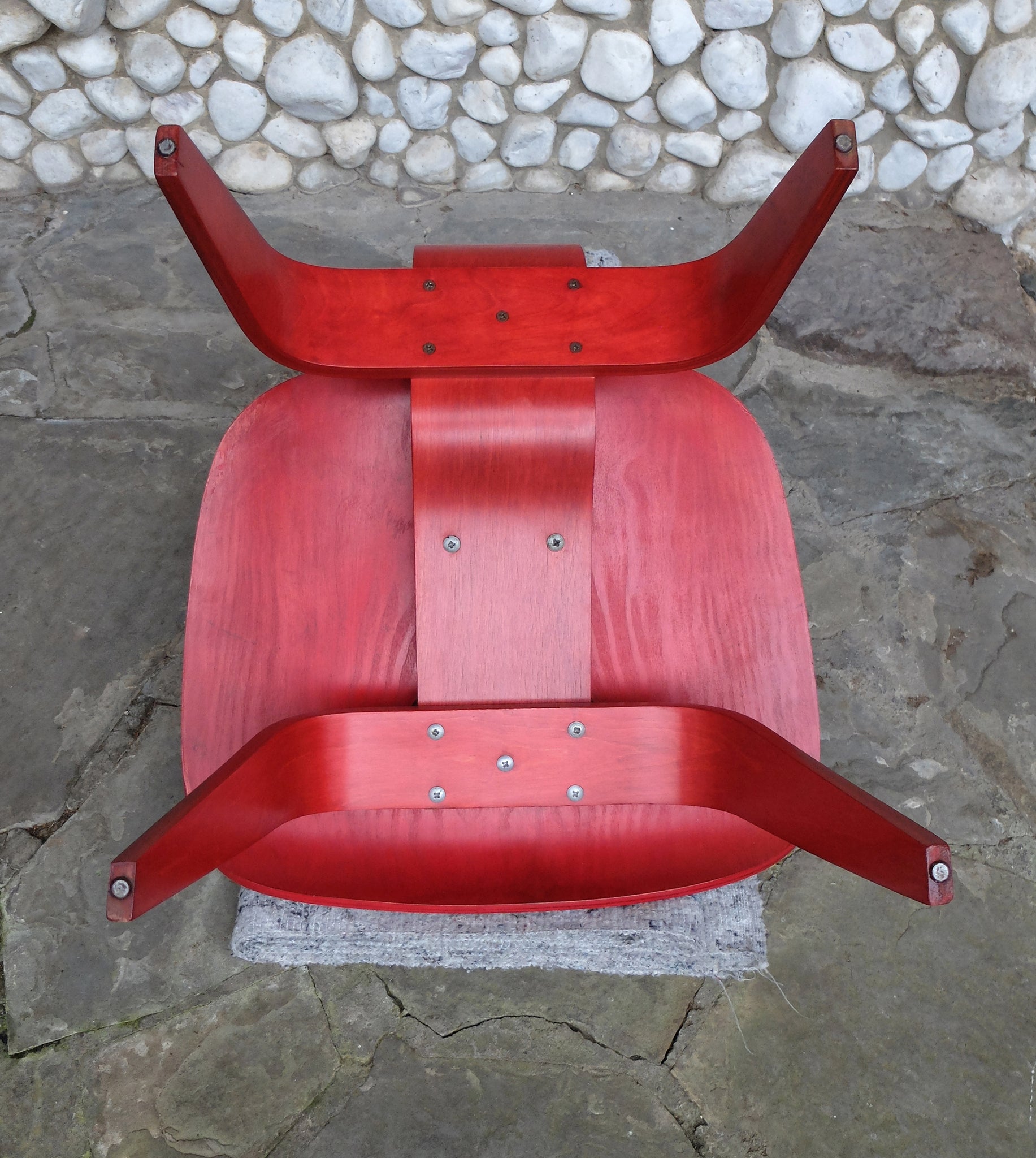 Red Stained LCW Lounge Chair by Charles & Ray Eames for Evans Products Company, 1948