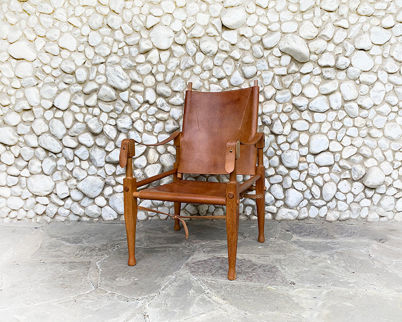 Safari Chair by Wilhelm Kienzle in leather for Wohnbedarf, Zürich, 1960s