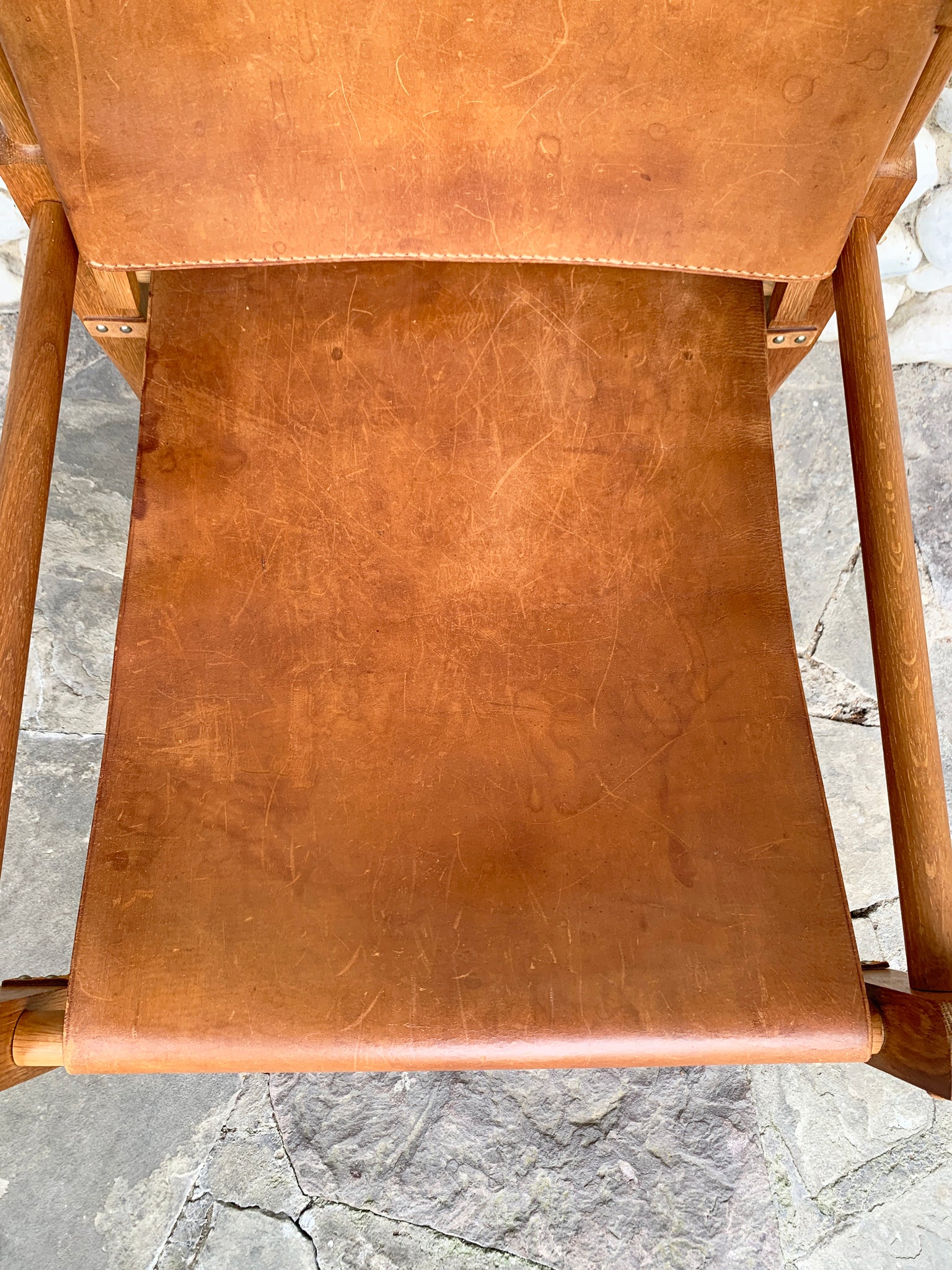 Safari Chair by Wilhelm Kienzle in leather for Wohnbedarf, Zürich, 1960s