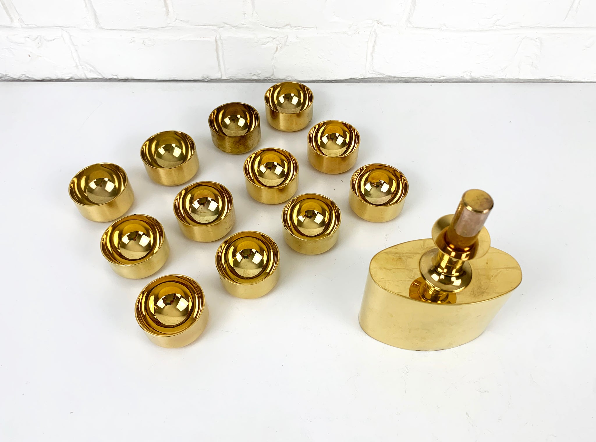 Decanter & 12 bowls in gold plated brass, Pierre Forsell for Skultuna, 1960s