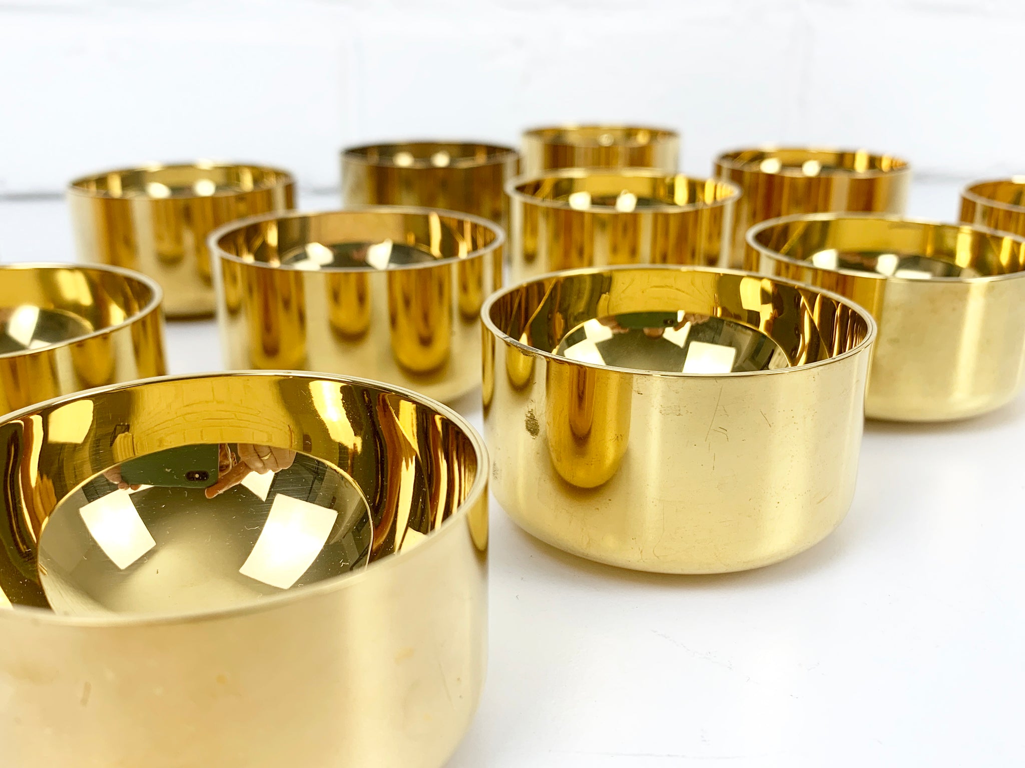 Decanter & 12 bowls in gold plated brass, Pierre Forsell for Skultuna, 1960s