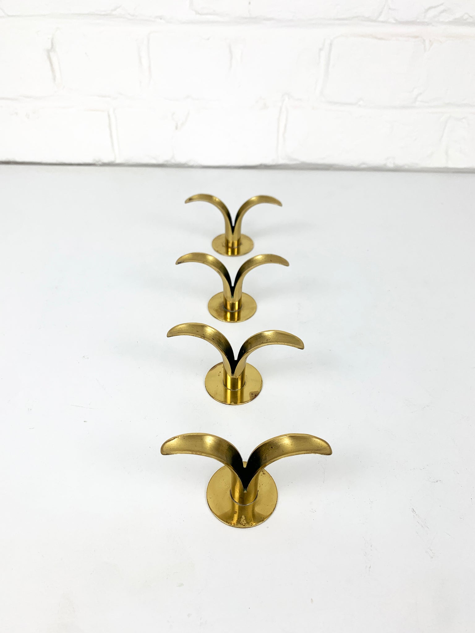 4 small Brass Lily Candleholders, Ivar Ålenius Björk for Lbe Konst, Ystad, Sweden