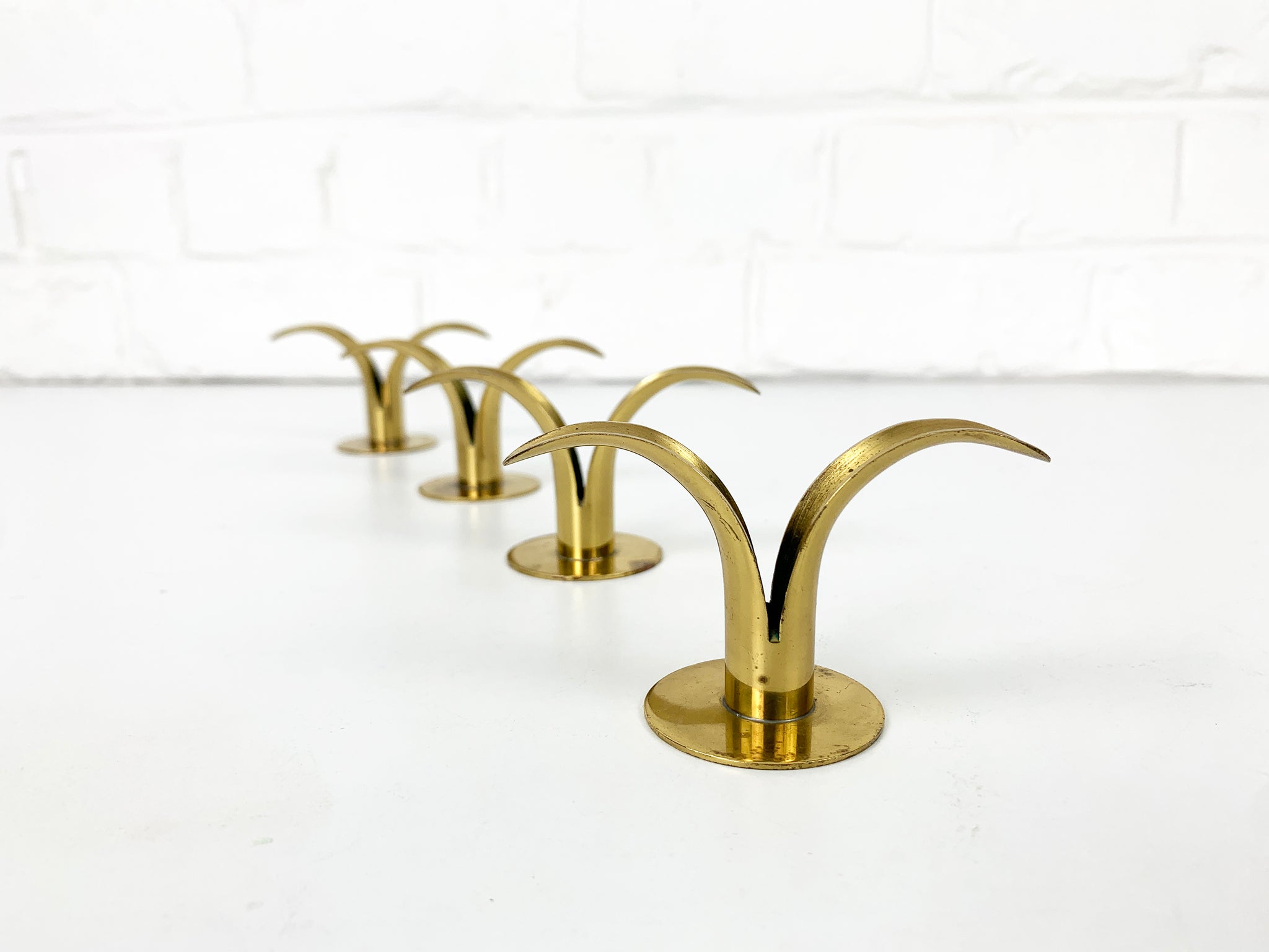 4 small Brass Lily Candleholders, Ivar Ålenius Björk for Lbe Konst, Ystad, Sweden