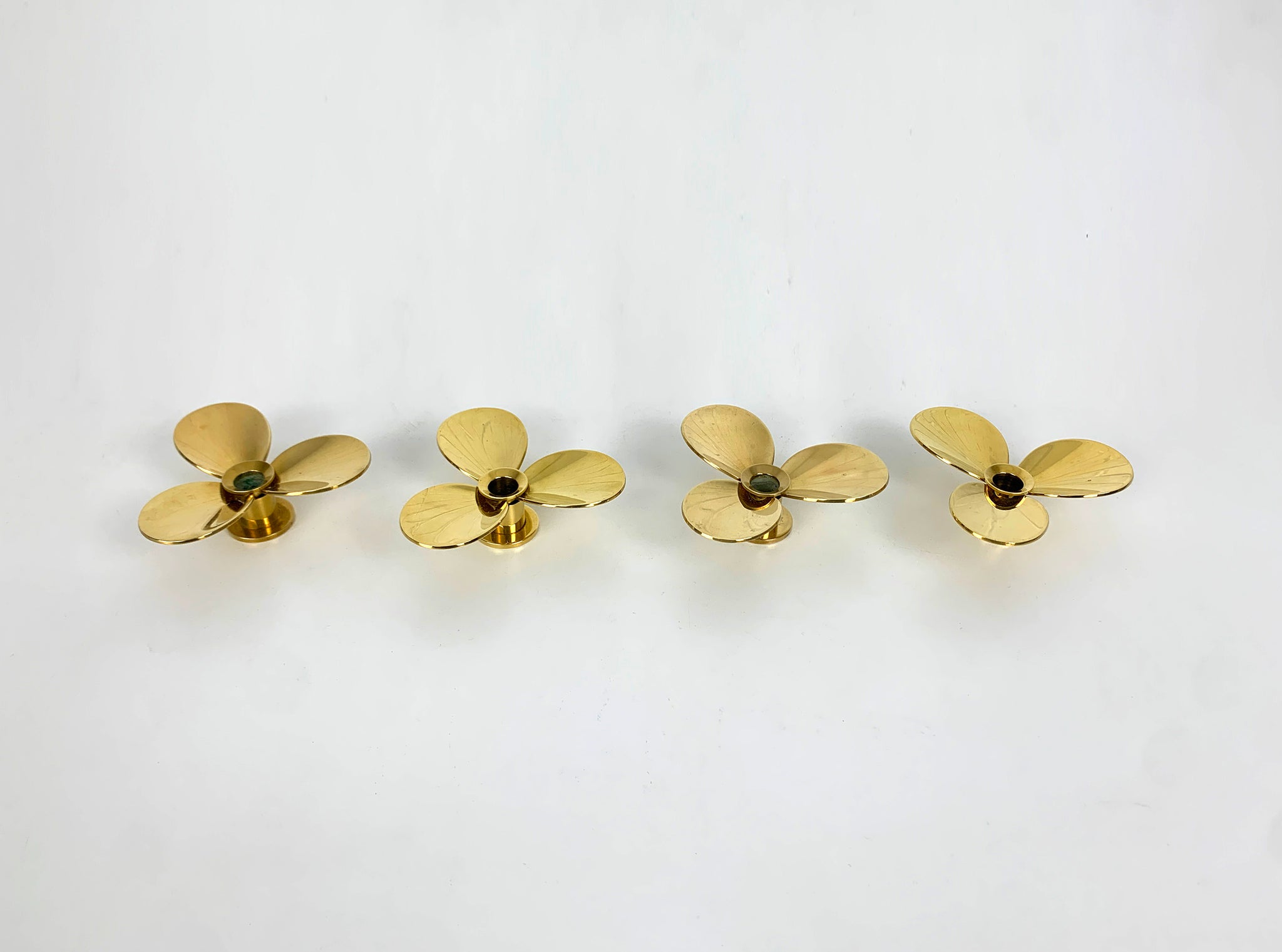 Set of 4 Propeller Candleholders in Brass by Pierre Forsell for Skultuna Sweden 1960s