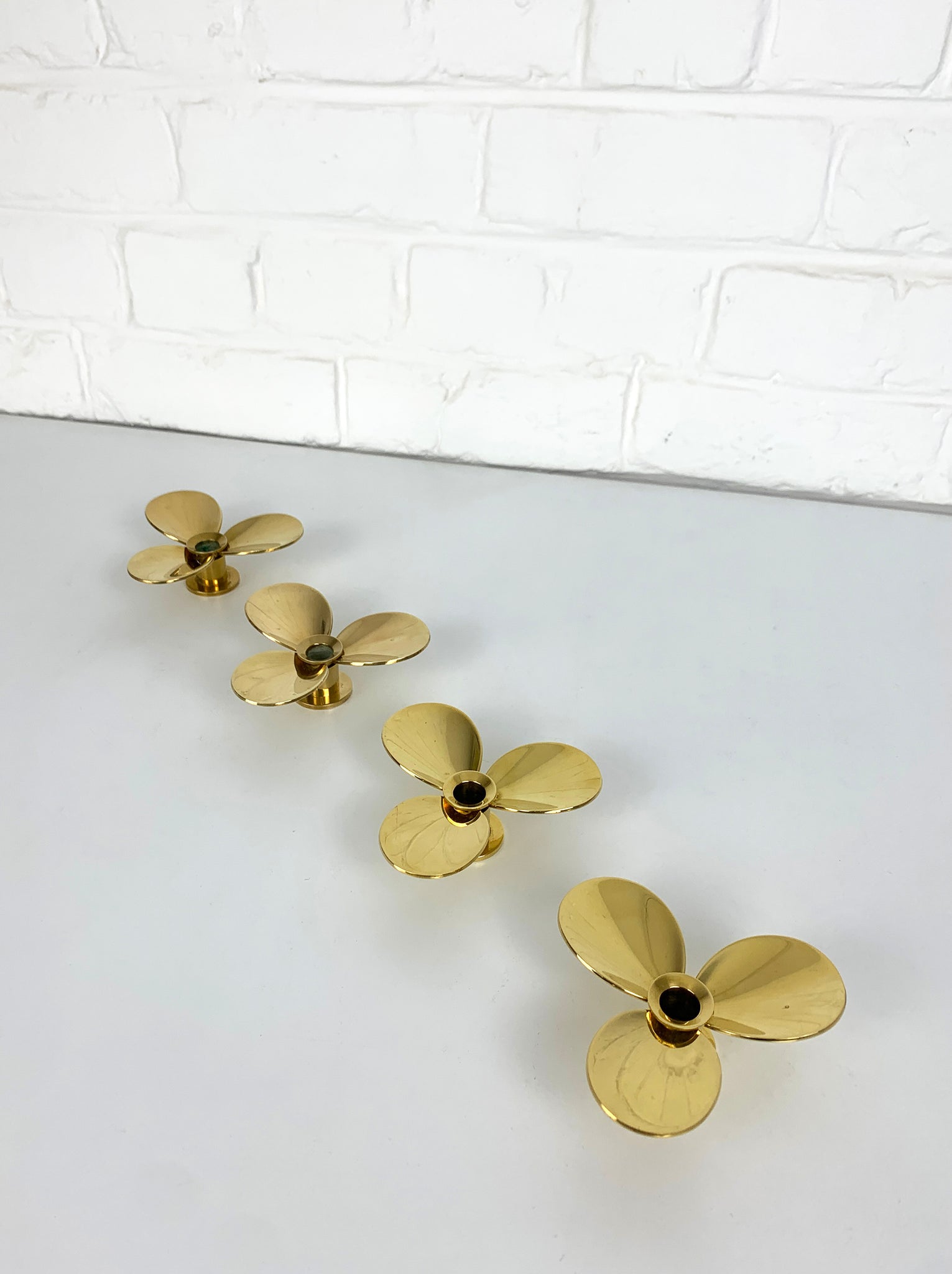 Set of 4 Propeller Candleholders in Brass by Pierre Forsell for Skultuna Sweden 1960s