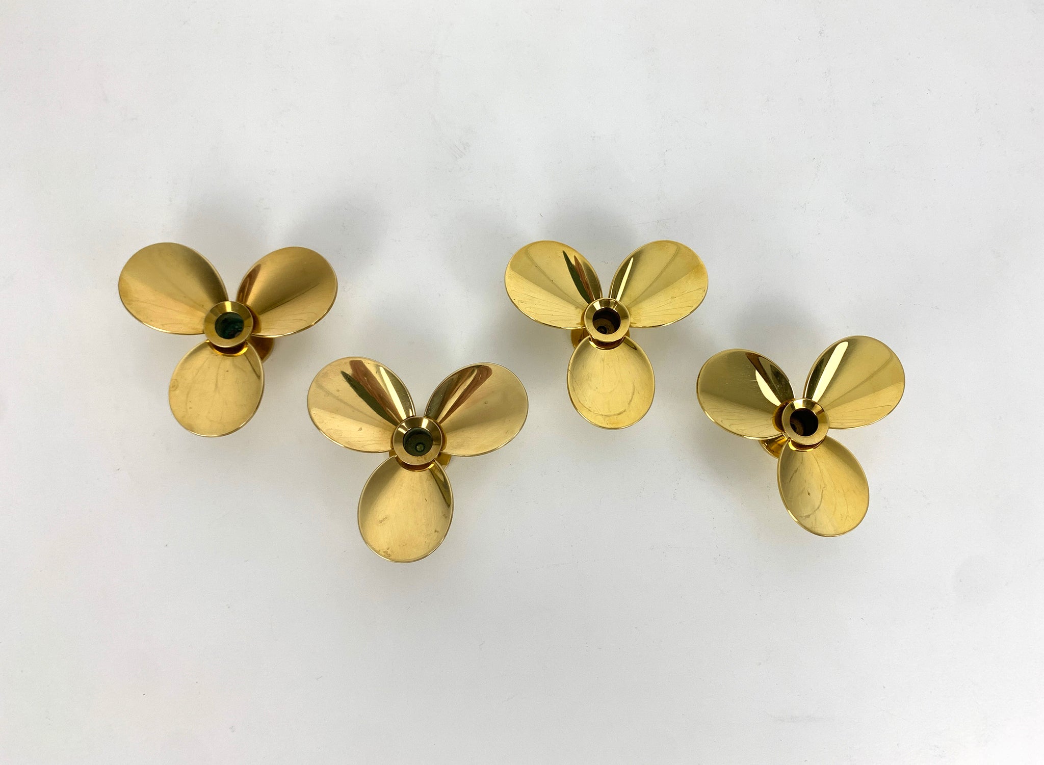 Set of 4 Propeller Candleholders in Brass by Pierre Forsell for Skultuna Sweden 1960s