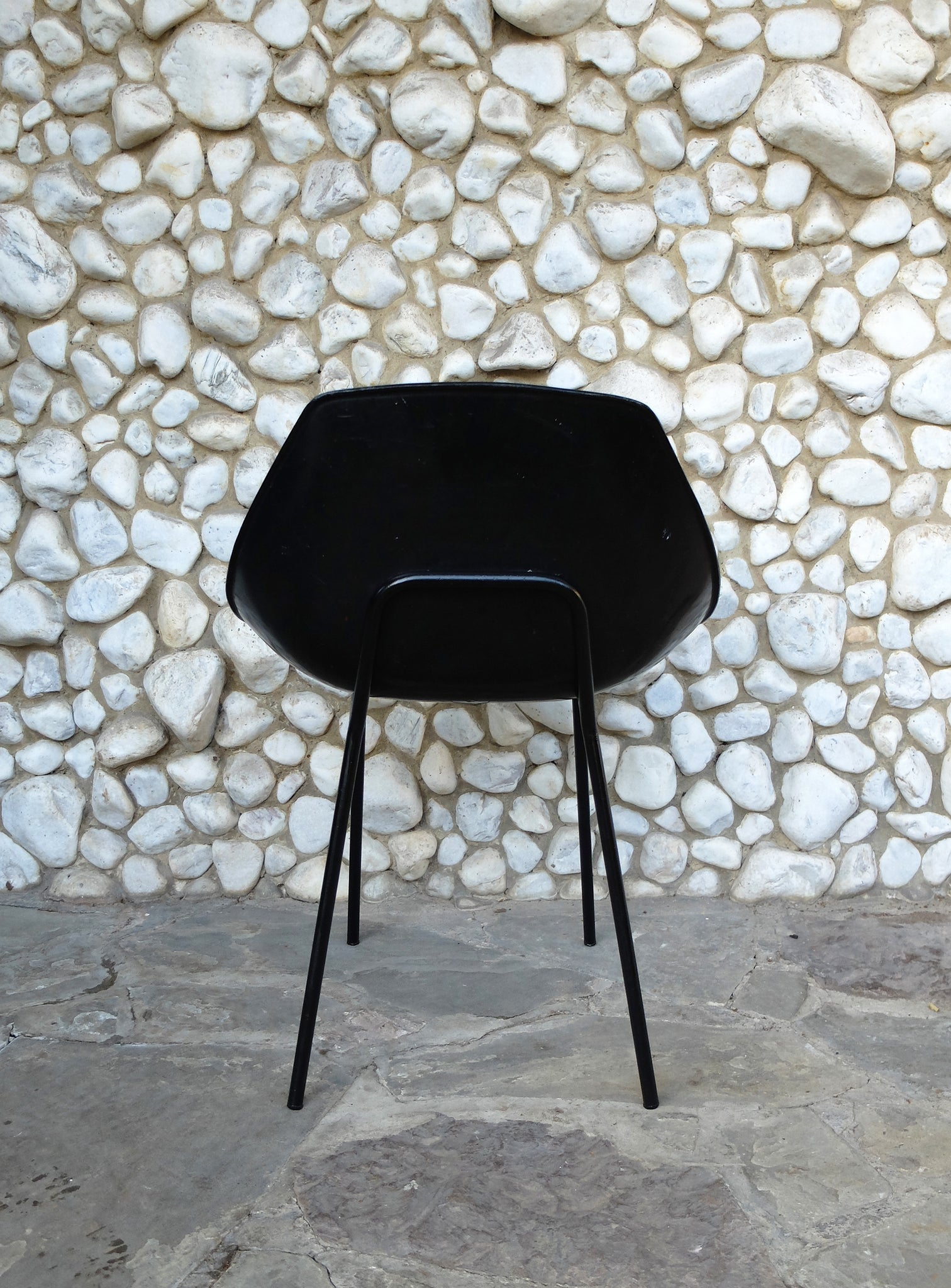 Black coquillage chair by Pierre Guariche for Meurop 1960s