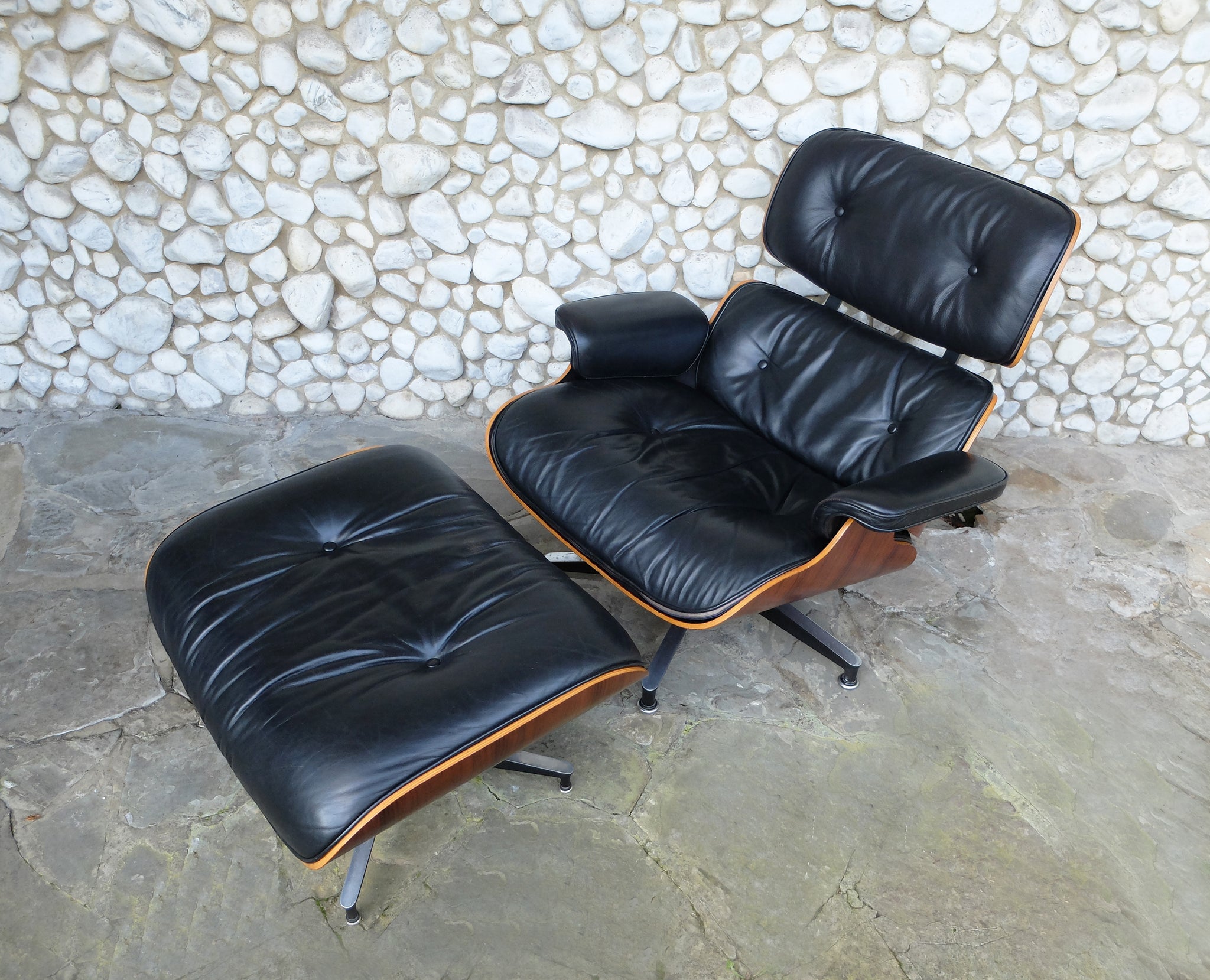 Rosewood Lounge Chair and Ottoman by Ray & Charles Eames for Herman Miller, 1970s