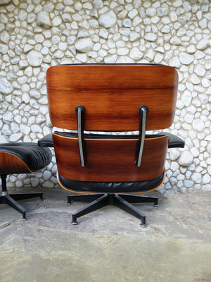 Rosewood Lounge Chair and Ottoman by Ray & Charles Eames for Herman Miller, 1970s