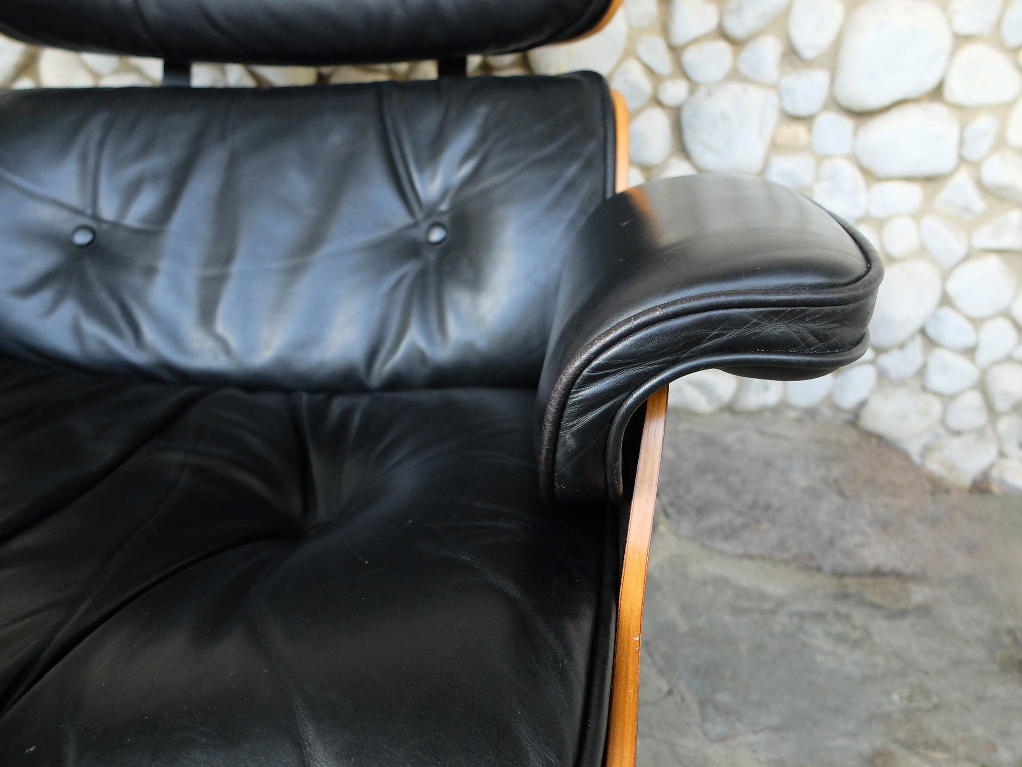 Rosewood Lounge Chair and Ottoman by Ray & Charles Eames for Herman Miller, 1970s