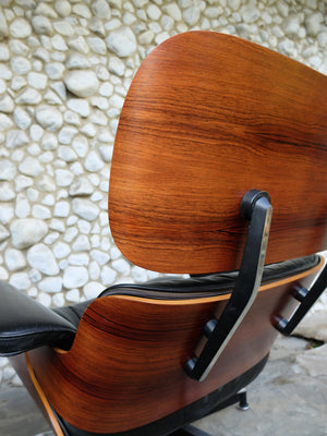 Rosewood Lounge Chair and Ottoman by Ray & Charles Eames for Herman Miller, 1970s