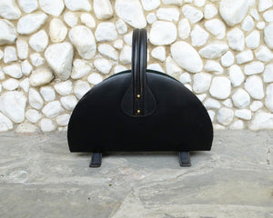 Mid-Century French Leather and Brass Magazine Rack in the style of Jacques Adnet