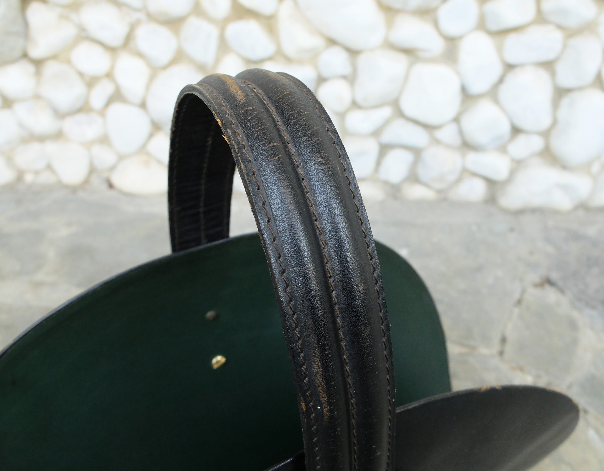 Mid-Century French Leather and Brass Magazine Rack in the style of Jacques Adnet